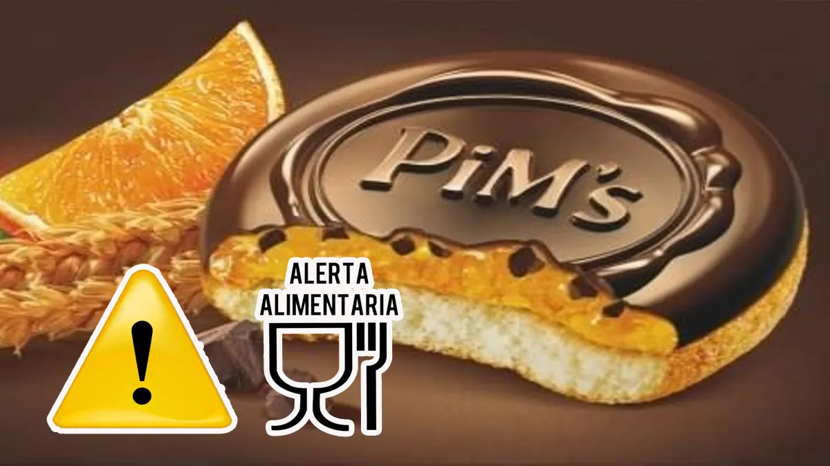 Galleta de naranja y chocolate junto con el signo de alerta alimentaria.